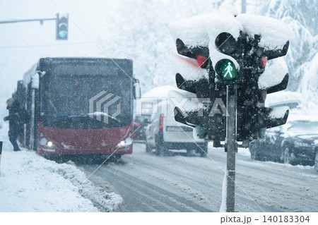 Traffic light covered with snow. Traffic light covered with snow. 140183304