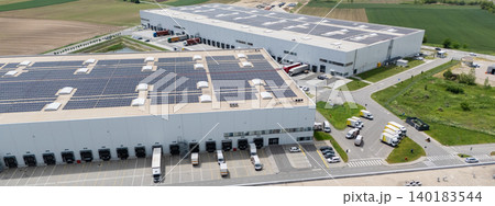 Logistics centers with solar panels on roofs. Aerial view 140183544