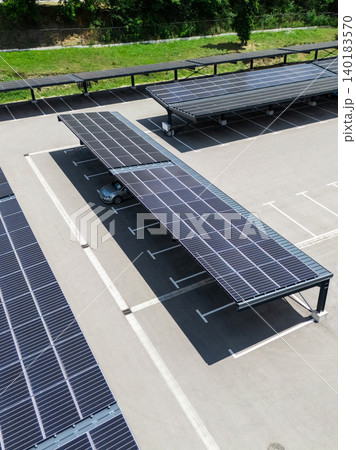 Parking space with solar panels on a roof. Parking space with solar panels on a roof. 140183570