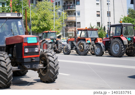 Farmers blocked traffic with tractors during a protest. Farmers blocked traffic with tractors during a protest. 140183791