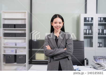 Smiling confident business woman leader portrait in modern office workplace. Smiling confident business woman leader portrait in modern office workplace. 140185681