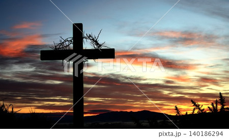 Cross and Crown of Thorns Hill Top Dawn Sky 140186294