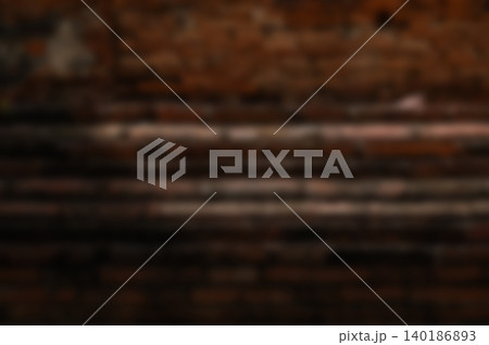 Defocused Antique Brick Wall Texture: Soft Blur Orange and Brown Clay Brick Surface, Warm Retro Backdrop for Product Placement Defocused Antique Brick Wall Texture: Soft Blur Orange and Brown Clay Brick Surface, Warm Retro Backdrop for Product Placement 140186893
