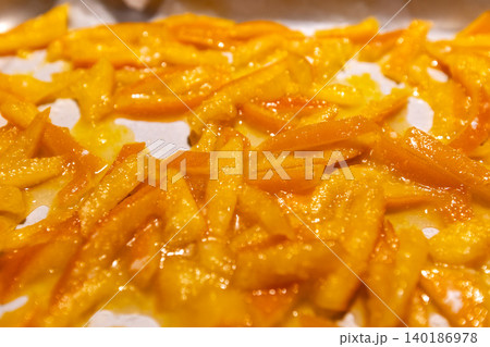 Top view of homemade candied orange peels drying Top view of homemade candied orange peels drying 140186978