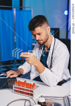 Attractive student of chemistry working in laboratory Attractive student of chemistry working in laboratory 140188924