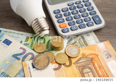 Cost of electric utilities with light bulb for payment. Cost of electric utilities with light bulb for payment. 140189655