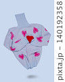 Light blue knitted turtleneck sweater with pink hearts print hugging a small red handmade heart, levitating on blue background. 140192358