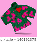 Green knitted turtleneck sweater with pink hearts pattern hugging a small red handmade heart, levitating on pink background. 140192375