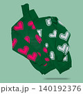 Two green knitted turtleneck sweaters with pink and white heart patterns levitating on green background. 140192376
