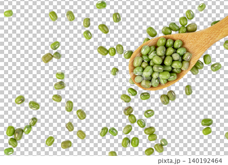 Top view of green mung beans scattered with a wooden spoon. Healthy plant-based protein source and dry legumes for cooking. Isolated. Top view of green mung beans scattered with a wooden spoon. Healthy plant-based protein source and dry legumes for cooking. Isolated. 140192464