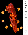 Directly above shot of Birds Eye dried Chilli on black background 140193154