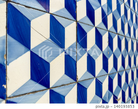 Side angle view of blue geometric azulejo tiles Side angle view of blue geometric azulejo tiles 140193853
