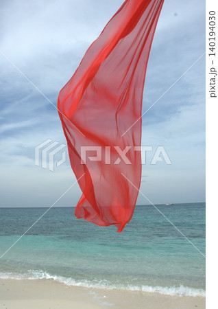 Red Color Cloth Flying In Wind Red Color Cloth Flying In Wind 140194030