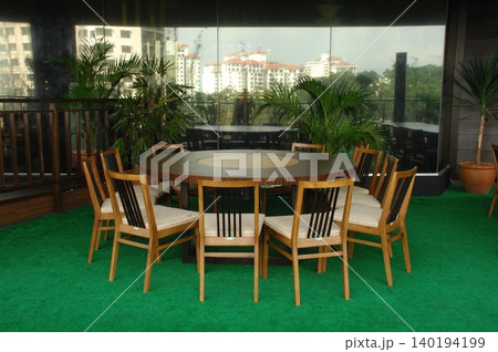 Chairs and Tables in the Restaurant 140194199