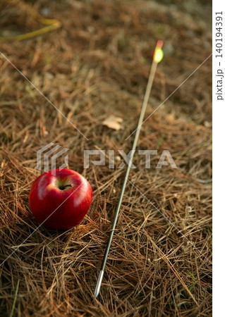 William tell metaphor with red apple and arrow William tell metaphor with red apple and arrow 140194391