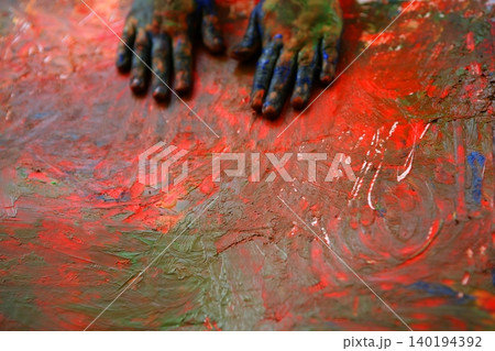 Children artist hands painting multi colors Children artist hands painting multi colors 140194392