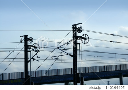 Cables and pole tower electric train railway Cables and pole tower electric train railway 140194405