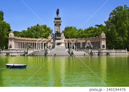 Retiro park lake in Madrid with fallen angel Retiro park lake in Madrid with fallen angel 140194476