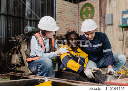 Accident worker injured on site colleague help assist, urgency workplace safety, emergency response. Accident worker injured on site colleague help assist, urgency workplace safety, emergency response. 140194505