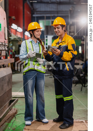 Professional worker man working in metal part workshop, Quality control staff looking product part. Professional worker man working in metal part workshop, Quality control staff looking product part. 140194567