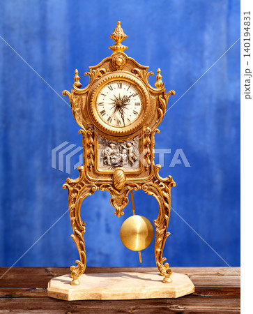 ancient vintage golden brass pendulum clock ancient vintage golden brass pendulum clock 140194831