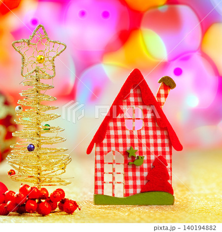 Christmas golden tree and red vichy house Christmas golden tree and red vichy house 140194882