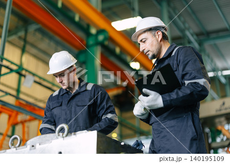 Engineer worker team service injection mold, Professional men work in die casting plant mold service Engineer worker team service injection mold, Professional men work in die casting plant mold service 140195109