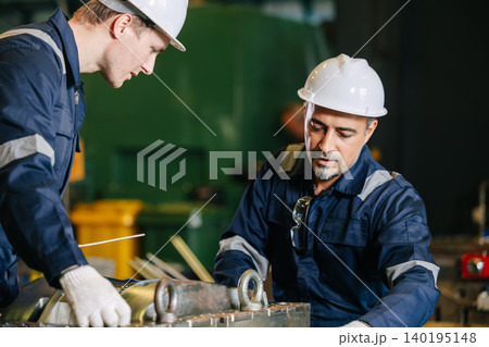 Engineer worker team service injection mold, Professional men work in die casting plant mold service Engineer worker team service injection mold, Professional men work in die casting plant mold service 140195148