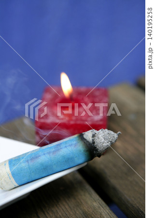 Natural theraphy, stones, and candles over wood Natural theraphy, stones, and candles over wood 140195258