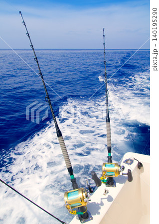 boat fishing trolling in deep blue sea boat fishing trolling in deep blue sea 140195290