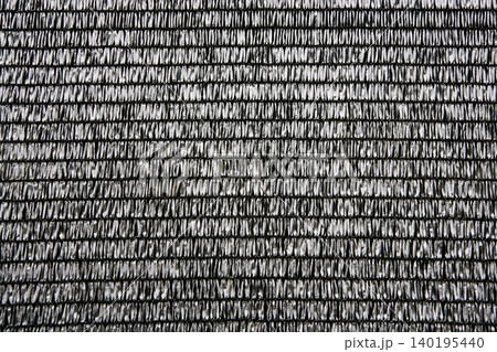 Gray raffia fabric plastic texture pattern background Gray raffia fabric plastic texture pattern background 140195440