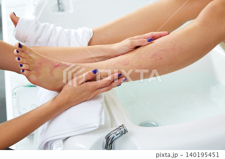 foot scrub pedicure woman leg in nail salon foot scrub pedicure woman leg in nail salon 140195451