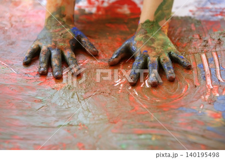 Children artist hands painting multi colors Children artist hands painting multi colors 140195498
