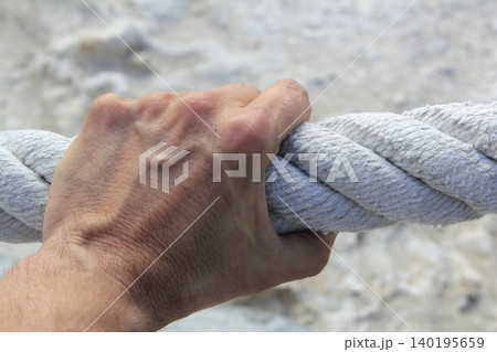man hand grab grip strong big aged rope man hand grab grip strong big aged rope 140195659