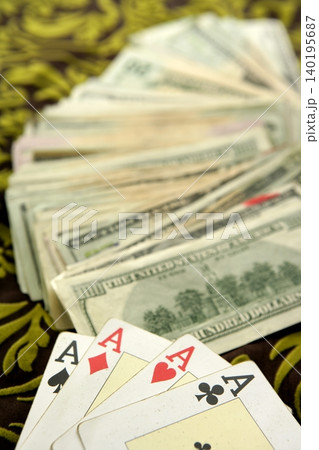 dollar notes and poker cards, gambler tools 140195687
