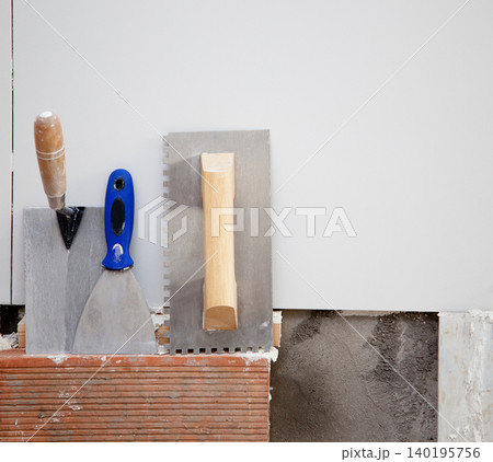 construction tools notched trowel ans spatula 140195756