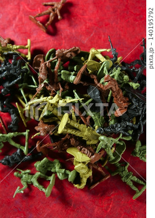 Metaphor of dead plastic toy war soldiers Metaphor of dead plastic toy war soldiers 140195792