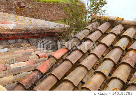 Clay old roof tiles pattern in Spain 140195798
