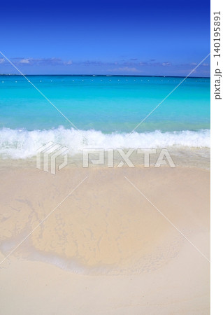 Caribbean turquoise sea beach shore white sand 140195891
