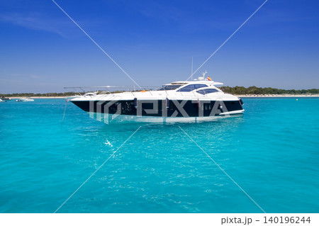 yatch in turquoise beach of Formentera yatch in turquoise beach of Formentera 140196244