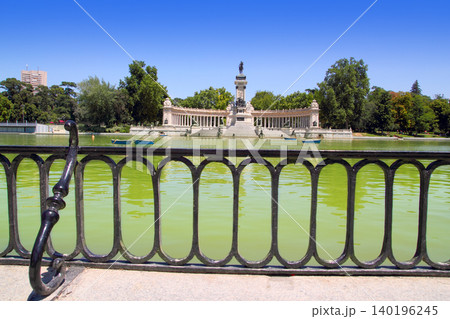 Retiro park lake in Madrid with fallen angel 140196245
