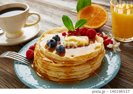 pancakes breakfast syrup coffe and orange juice pancakes breakfast syrup coffe and orange juice 140196537