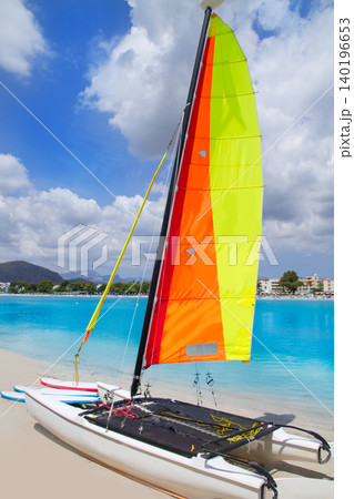 Beach of Puerto de Alcudia in Mallorca with hobie cat Beach of Puerto de Alcudia in Mallorca with hobie cat 140196653