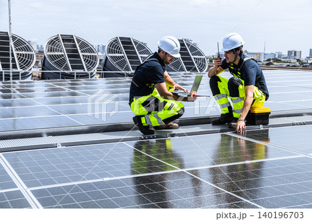 Professional Engineer Team Service Solar Panel. Worker Maintenance Cleaning Replacing Solar Panel. 140196703