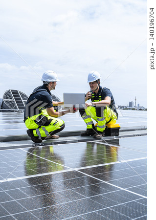 Professional Engineer Team Service Solar Panel. Worker Maintenance Cleaning Replacing Solar Panel. Professional Engineer Team Service Solar Panel. Worker Maintenance Cleaning Replacing Solar Panel. 140196704