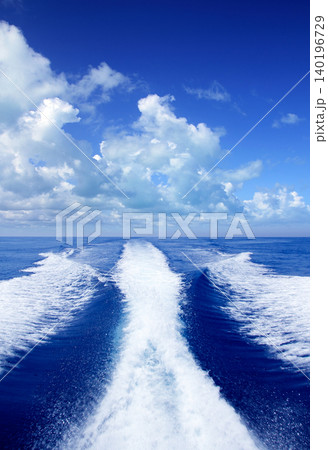 Boat wake prop wash on blue ocean sea 140196729