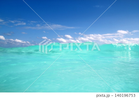 blue turquoise wave caribbean sea water foam 140196753