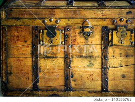 Old wooden chest, trunk in golden color Old wooden chest, trunk in golden color 140196765