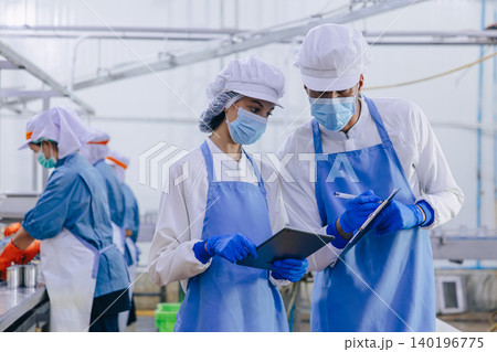 Food hygiene officer inspecting and certifying the cleanliness of fish production product factory, Food hygiene officer inspecting and certifying the cleanliness of fish production product factory, 140196775