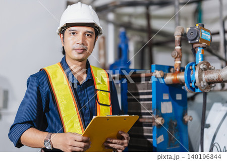 Industrial factory worker, Engineer working in plant factory, Check service plumbing pipe system. Industrial factory worker, Engineer working in plant factory, Check service plumbing pipe system. 140196844